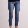 front view of model in the unreal jean by inlarkin showing the slimming fit with seam and zipper detail at the ankles 