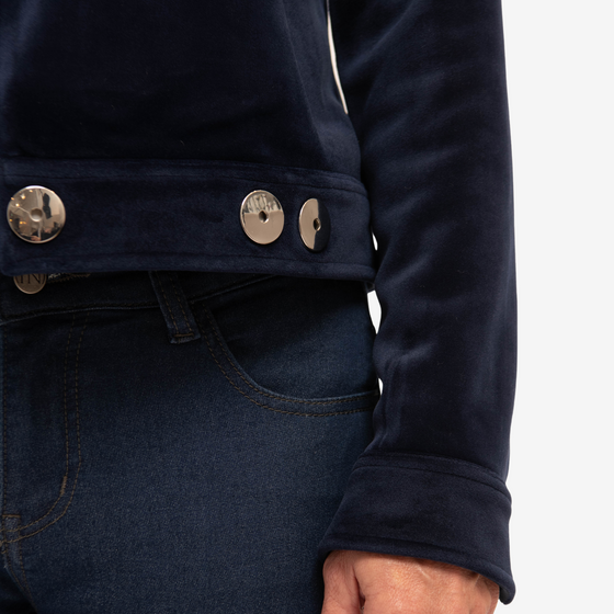 navy velour jacket with piping details on seam, waistband with two snaps at center with functional belt closure