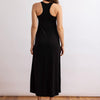 full back view of the wingspan dress in black by inlarkin showing the tank top back detain and flattering flowy fit